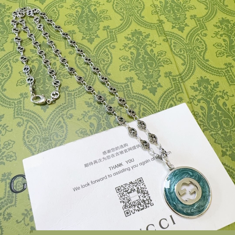 G*u*i necklaces